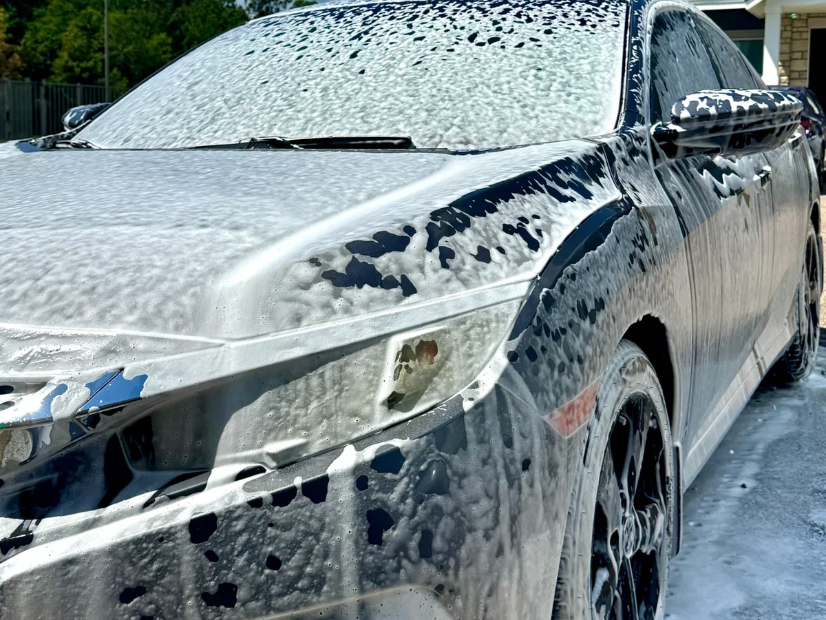 Mercedes covered in foam during an exterior pre-wash