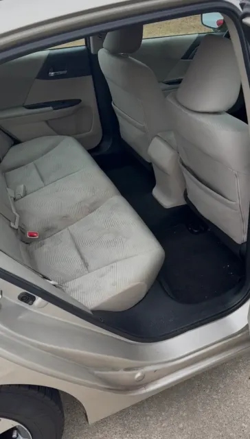 Stained cloth rear seats before detailing